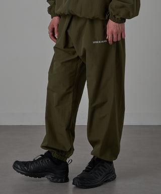 One Point Embroidery Nylon Track Pants Set-up Compatible LESS IS MORE