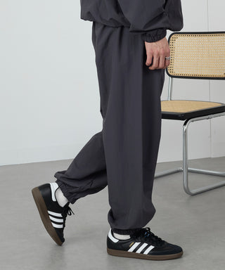 One Point Embroidery Nylon Track Pants Set-up Compatible LESS IS MORE