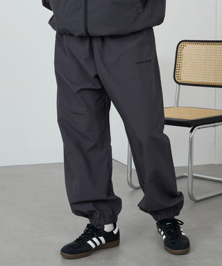 One Point Embroidery Nylon Track Pants Set-up Compatible LESS IS MORE
