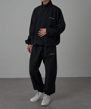 One Point Embroidery Nylon Track Pants Set-up Compatible LESS IS MORE