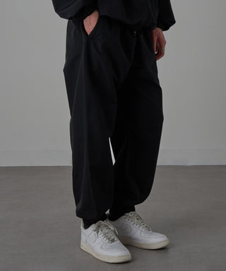 One Point Embroidery Nylon Track Pants Set-up Compatible LESS IS MORE